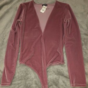 Pink body suit